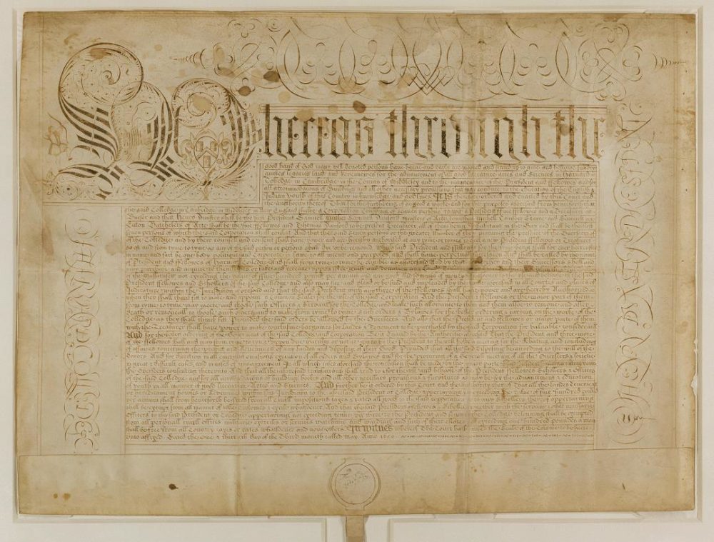 Image of the Harvard College Charter-- writing on yellowed parchment.