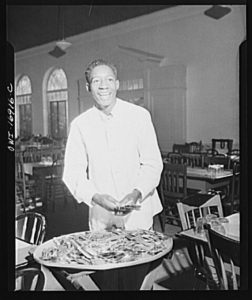 Student Working in the Dining Hall, Photograph